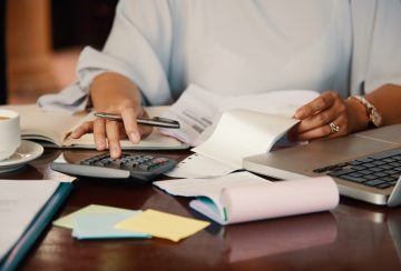 Entrepreneur working with bills